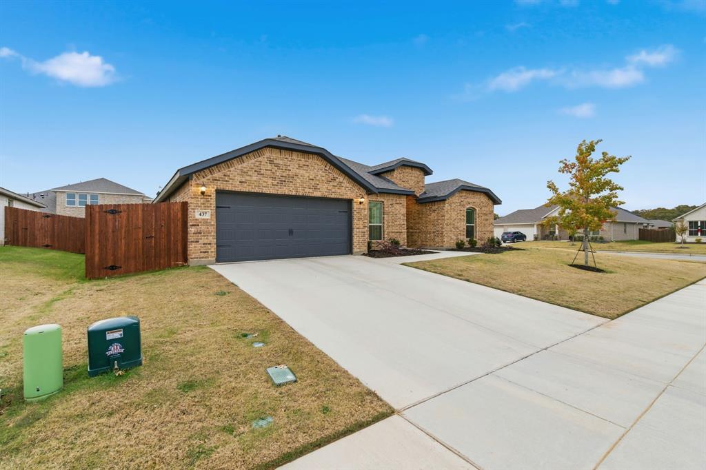 437 Falcon Way Azle, TX 76020 - Photo 3 of 40 a view of outdoor space yard and front view of a house