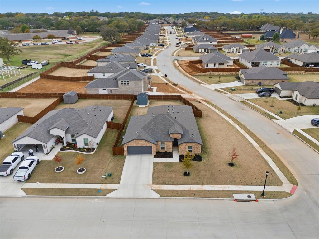 437 Falcon Way Azle, TX 76020 - Photo 37 of 40 an aerial view of residential houses with outdoor space