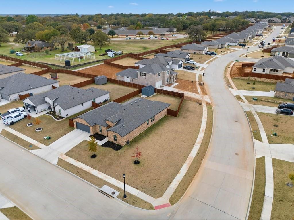 437 Falcon Way Azle, TX 76020 - Photo 38 of 40 an aerial view of residential houses with outdoor space