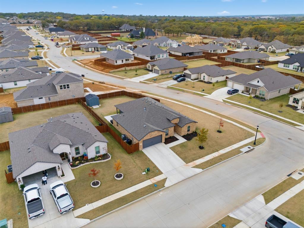 437 Falcon Way Azle, TX 76020 - Photo 39 of 40 an aerial view of residential houses with outdoor space