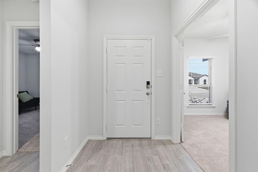 437 Falcon Way Azle, TX 76020 - Photo 6 of 40 wooden floor in a gallery