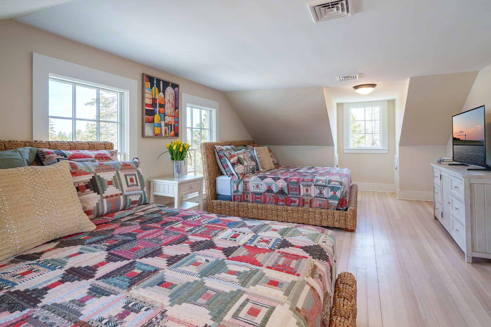30 Mill Hill Road Edgartown, MA 02539 - Photo 24 of 35 a bedroom with a bed and wooden floor