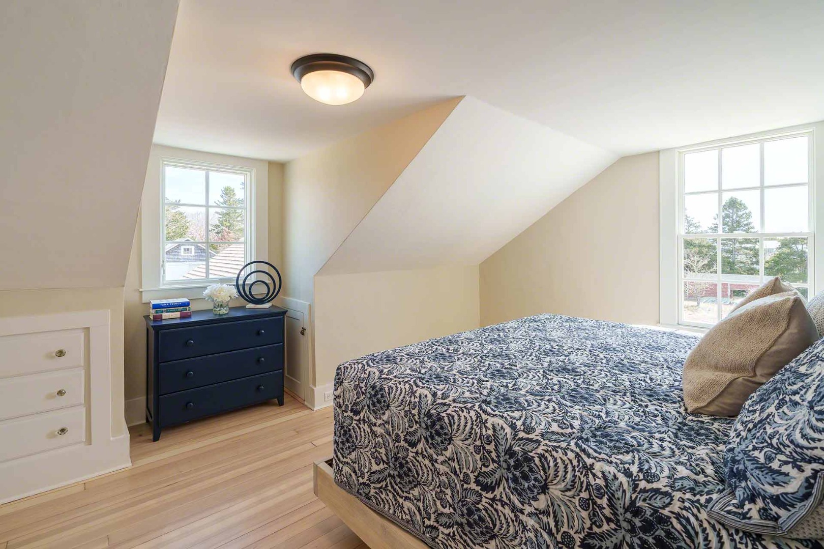 30 Mill Hill Road Edgartown, MA 02539 - Photo 27 of 35 a bedroom with a bed and a dresser