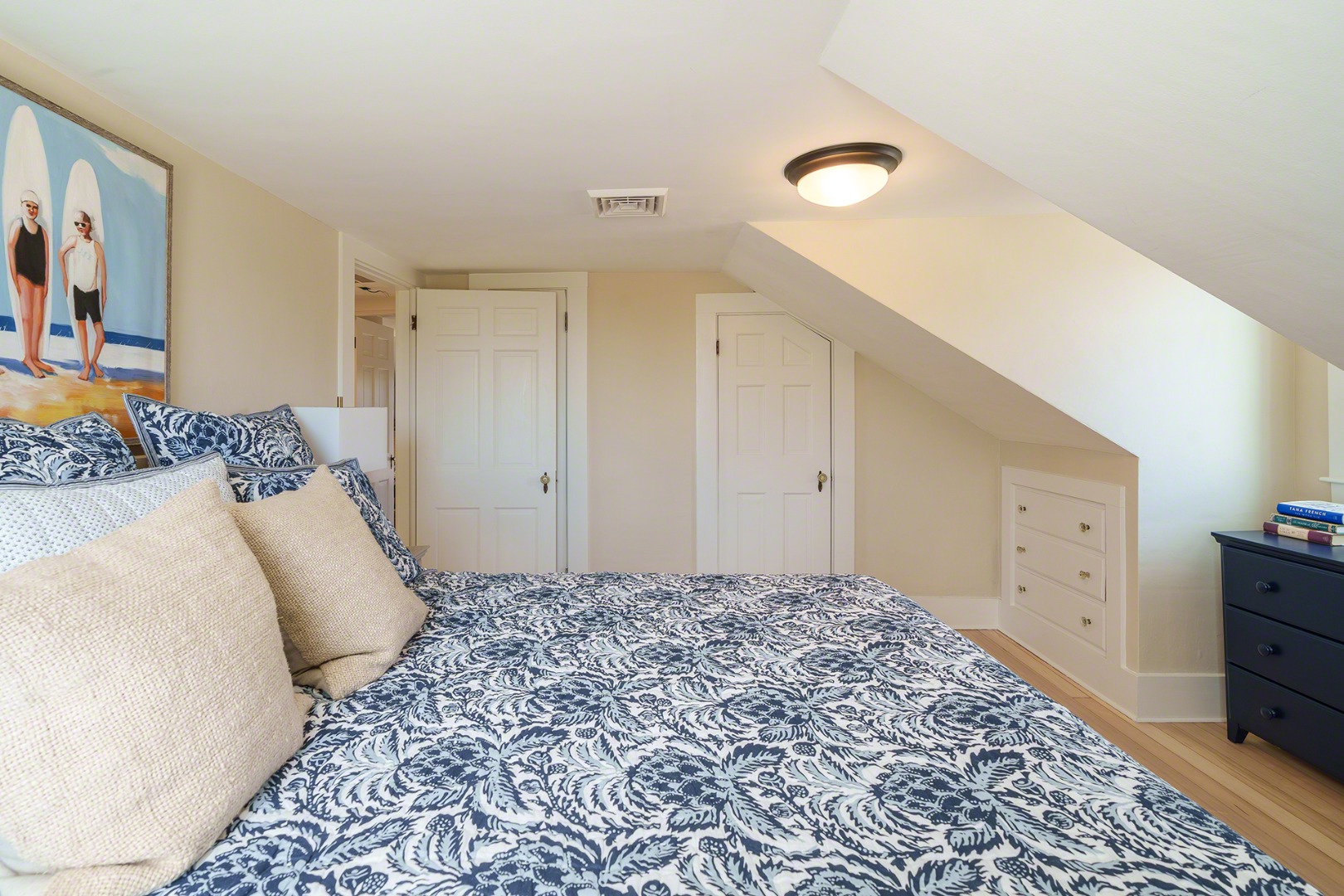 30 Mill Hill Road Edgartown, MA 02539 - Photo 28 of 35 a bedroom with a bed and a cabinets