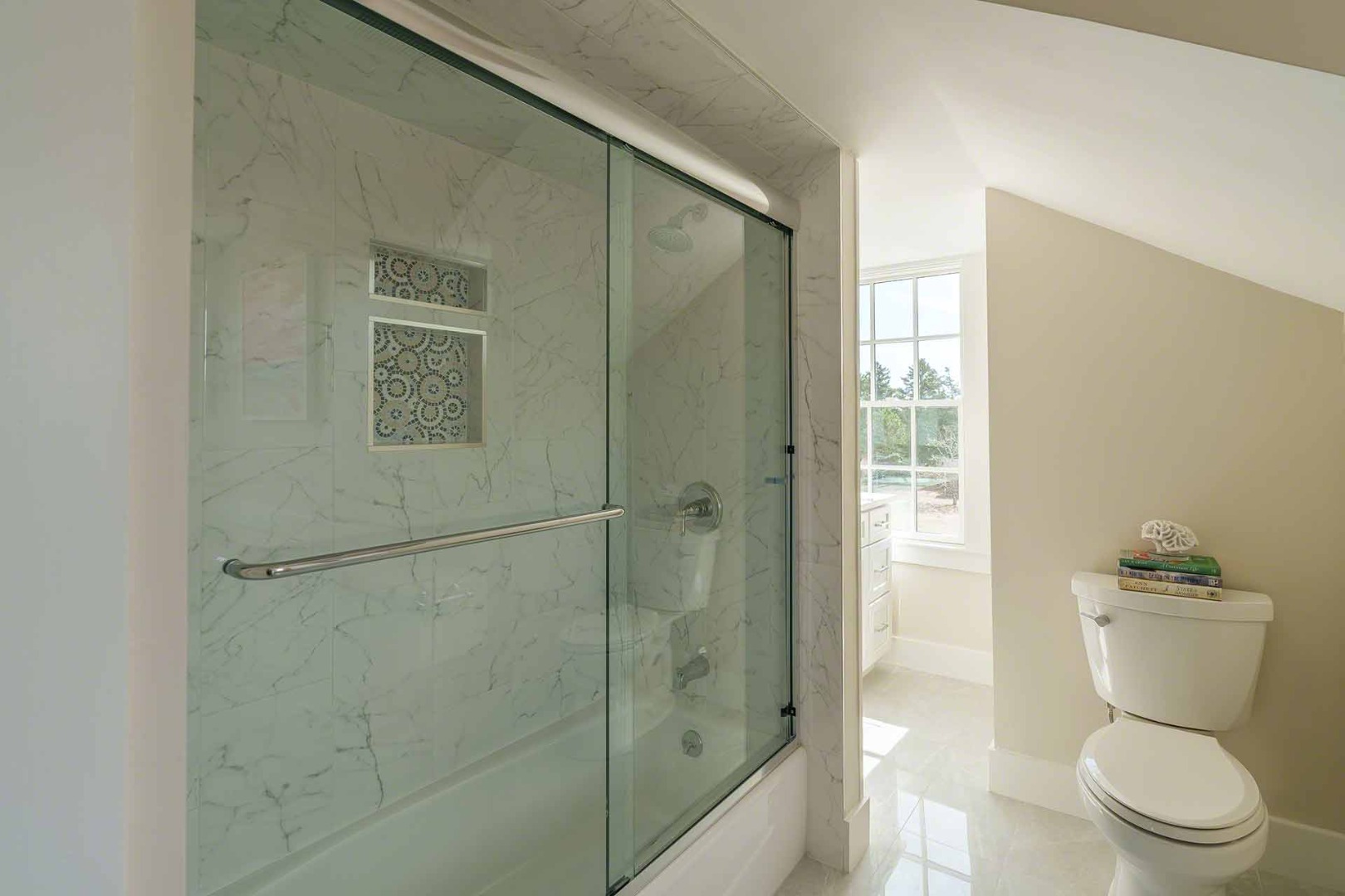 30 Mill Hill Road Edgartown, MA 02539 - Photo 29 of 35 a bathroom with a toilet a sink and shower