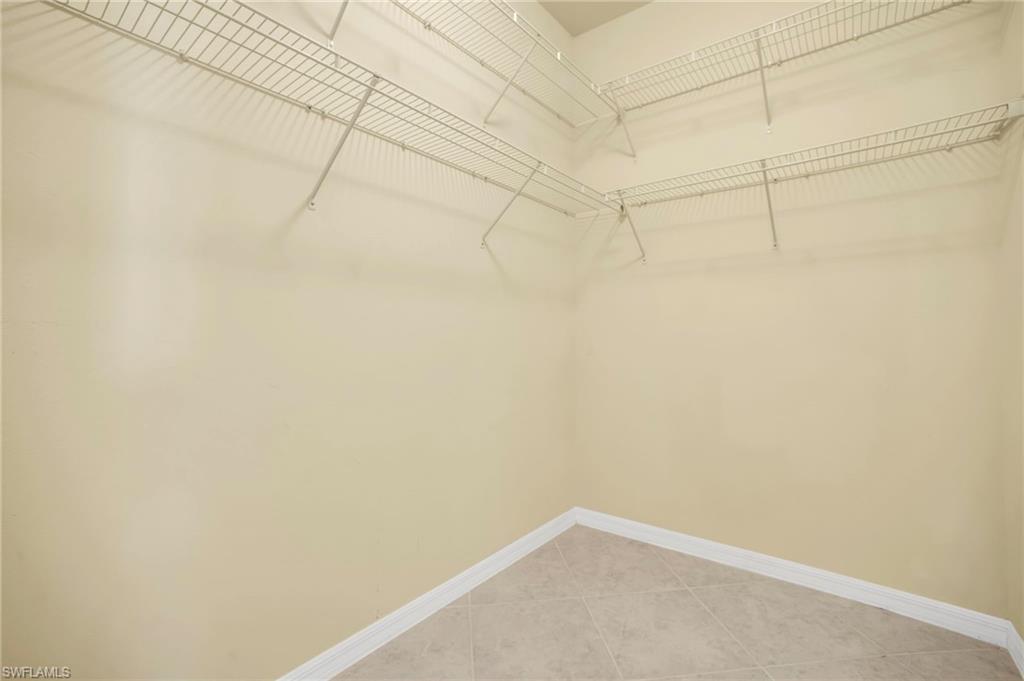 14513 Lanier Court Naples, FL 34114 - Photo 14 of 42 Separate double closets in primary bedroom