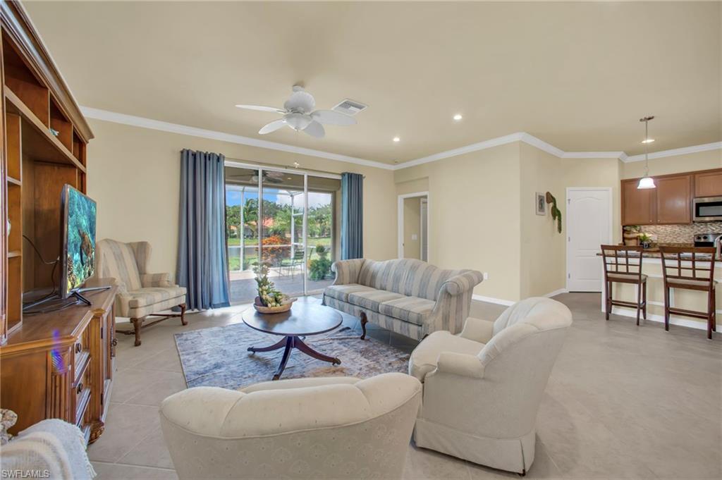 14513 Lanier Court Naples, FL 34114 - Photo 24 of 42 Living room with pond view