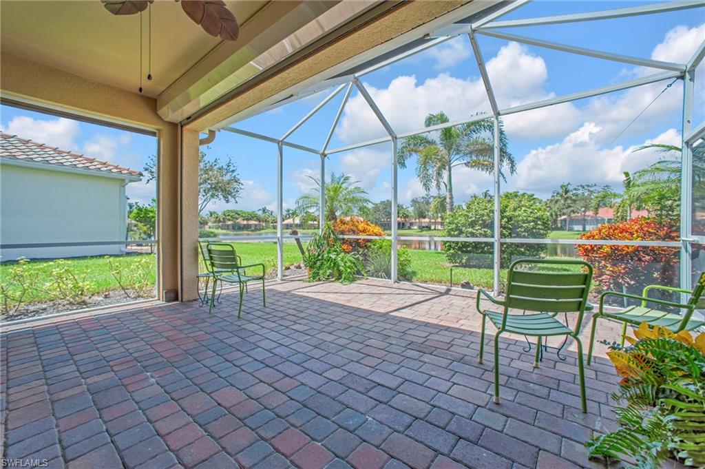 14513 Lanier Court Naples, FL 34114 - Photo 27 of 42 Extended lanai with pond view