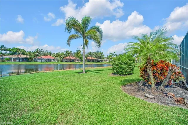 a view of a lake with a big yard