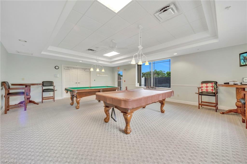 14513 Lanier Court Naples, FL 34114 - Photo 39 of 42 Recreation room featuring a raised ceiling, carpet floors, pool table, and ceiling fan