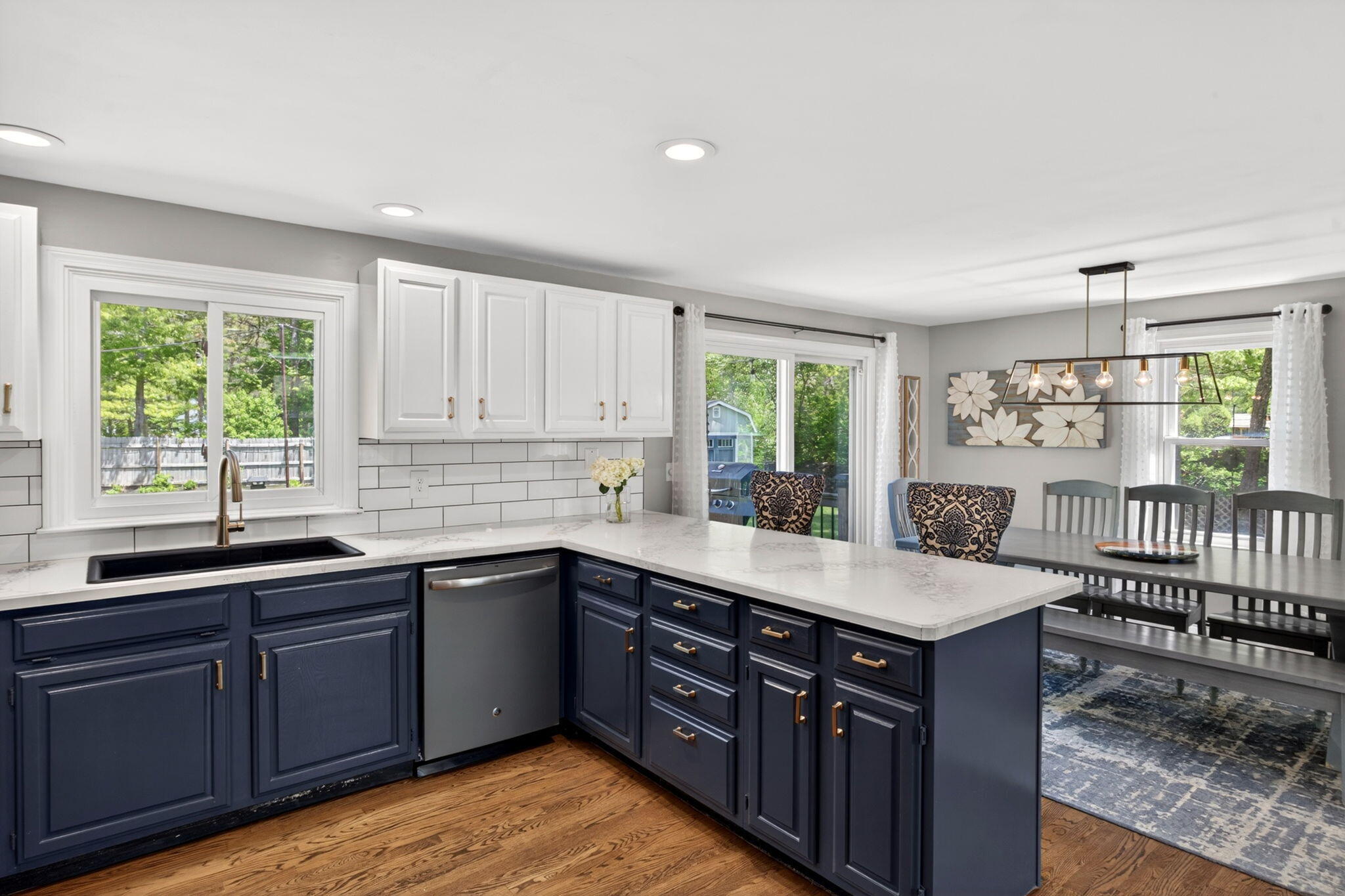 12 Sarah Lawrence Road Sandwich, MA 02563 - Photo 6 of 54 a kitchen with a sink window and cabinets