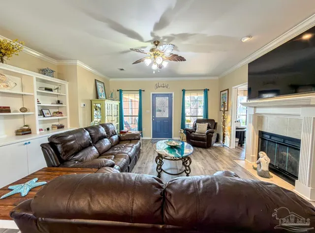 a work room with furniture and a window