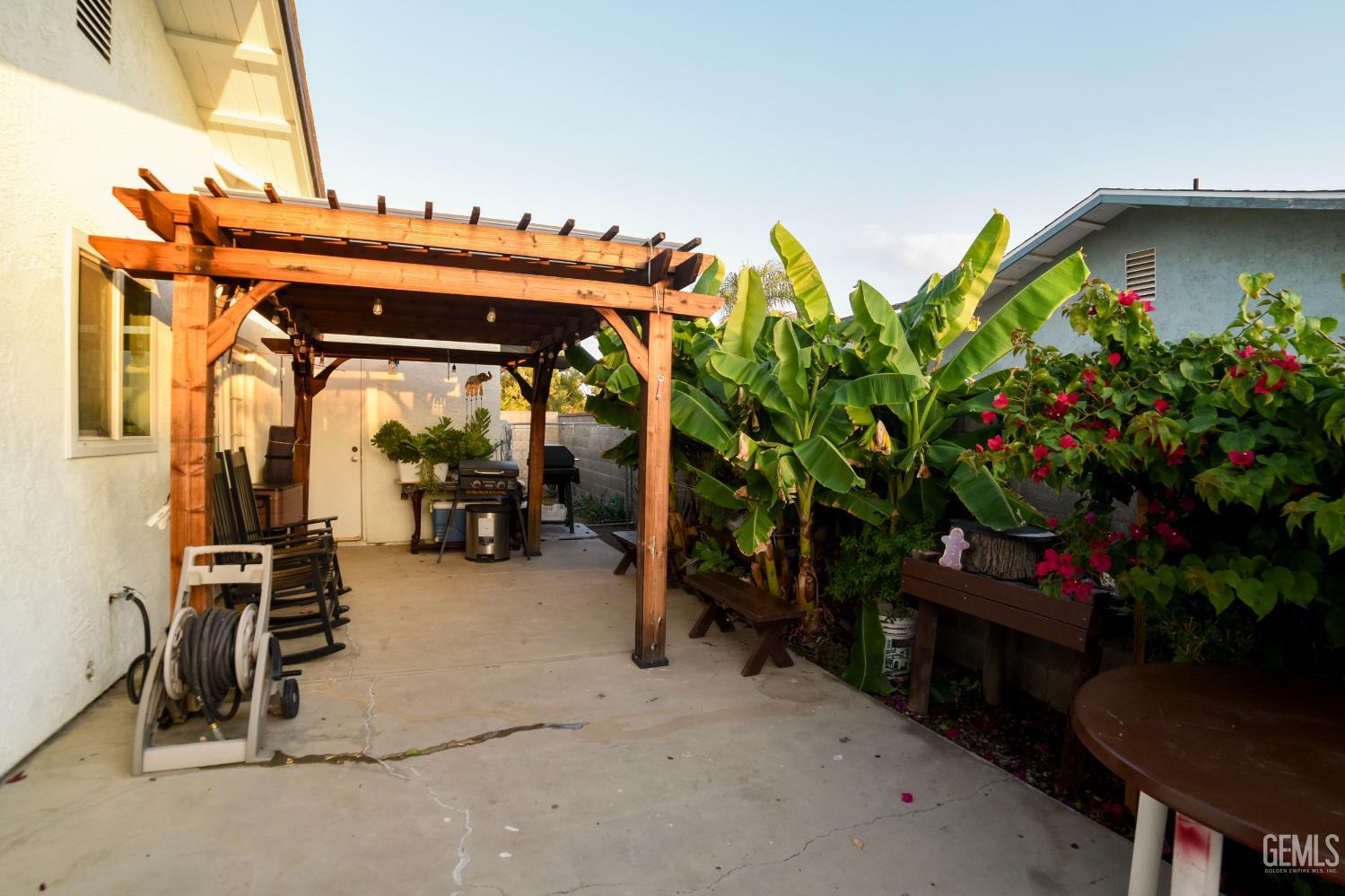 Undisclosed Address Wasco, CA 93280 - Photo 14 of 22 a view of a garage with furniture
