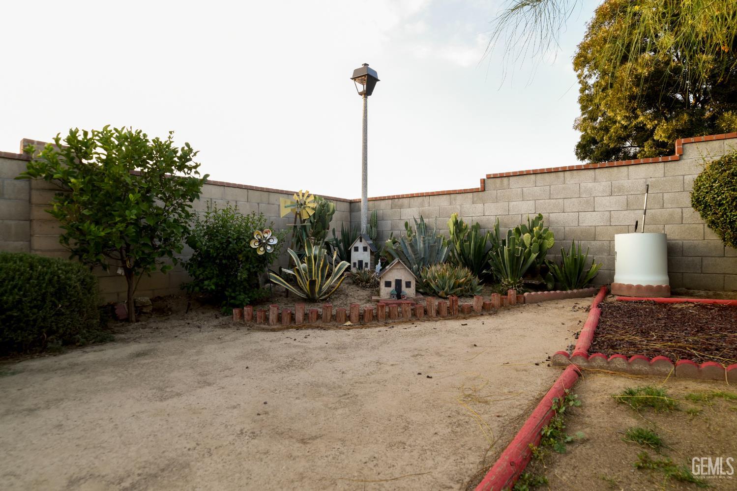 Undisclosed Address Wasco, CA 93280 - Photo 18 of 22 a view of a backyard