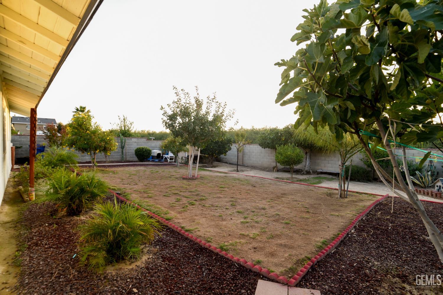 Undisclosed Address Wasco, CA 93280 - Photo 21 of 22 a view of a backyard