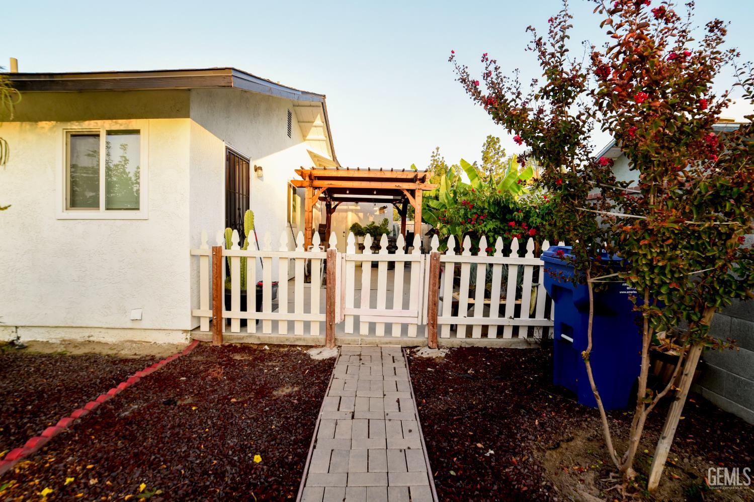 Undisclosed Address Wasco, CA 93280 - Photo 22 of 22 a view of a house with a yard