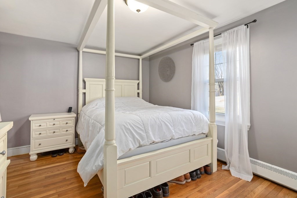 63 Maple Street Middleton, MA 01949 - Photo 15 of 36 a bed room with a bed and a window