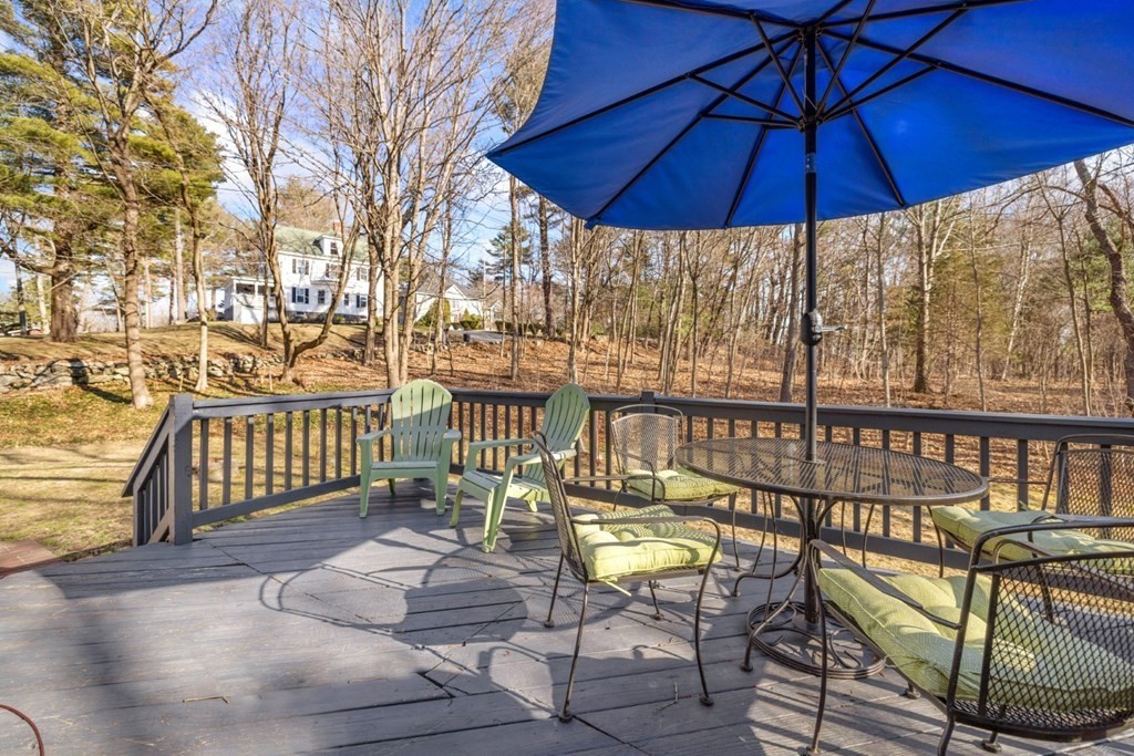 63 Maple Street Middleton, MA 01949 - Photo 33 of 36 a view of a chairs and table in the balcony