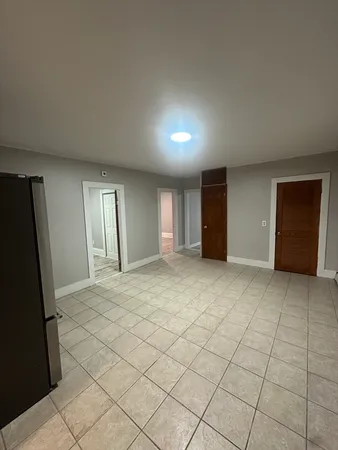 a view of an empty room and window