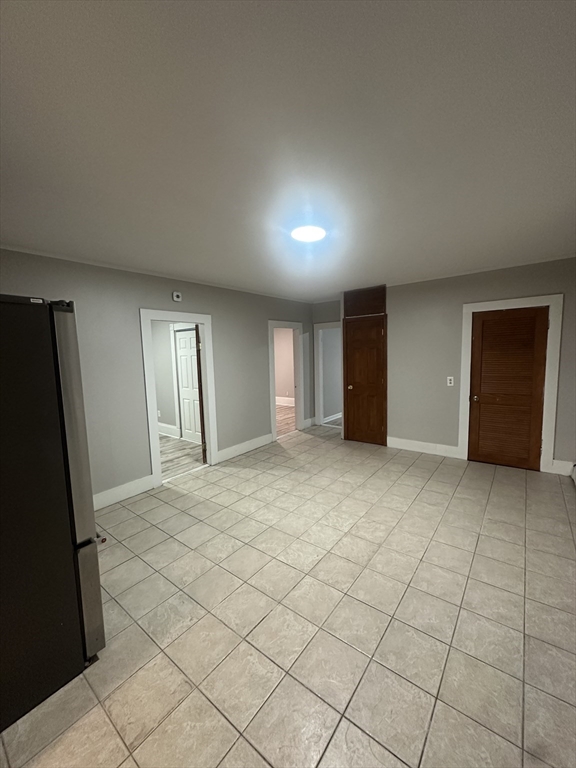 269 South Broadway, Unit 2 Lawrence, MA 01843 - Photo 11 of 12 a view of an empty room and window