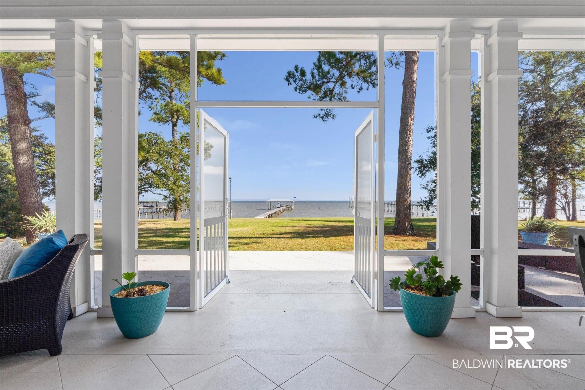 7015 Bay Road Mobile, AL 36605 - Photo 13 of 53 screened in porch overlooking Mobile Bay