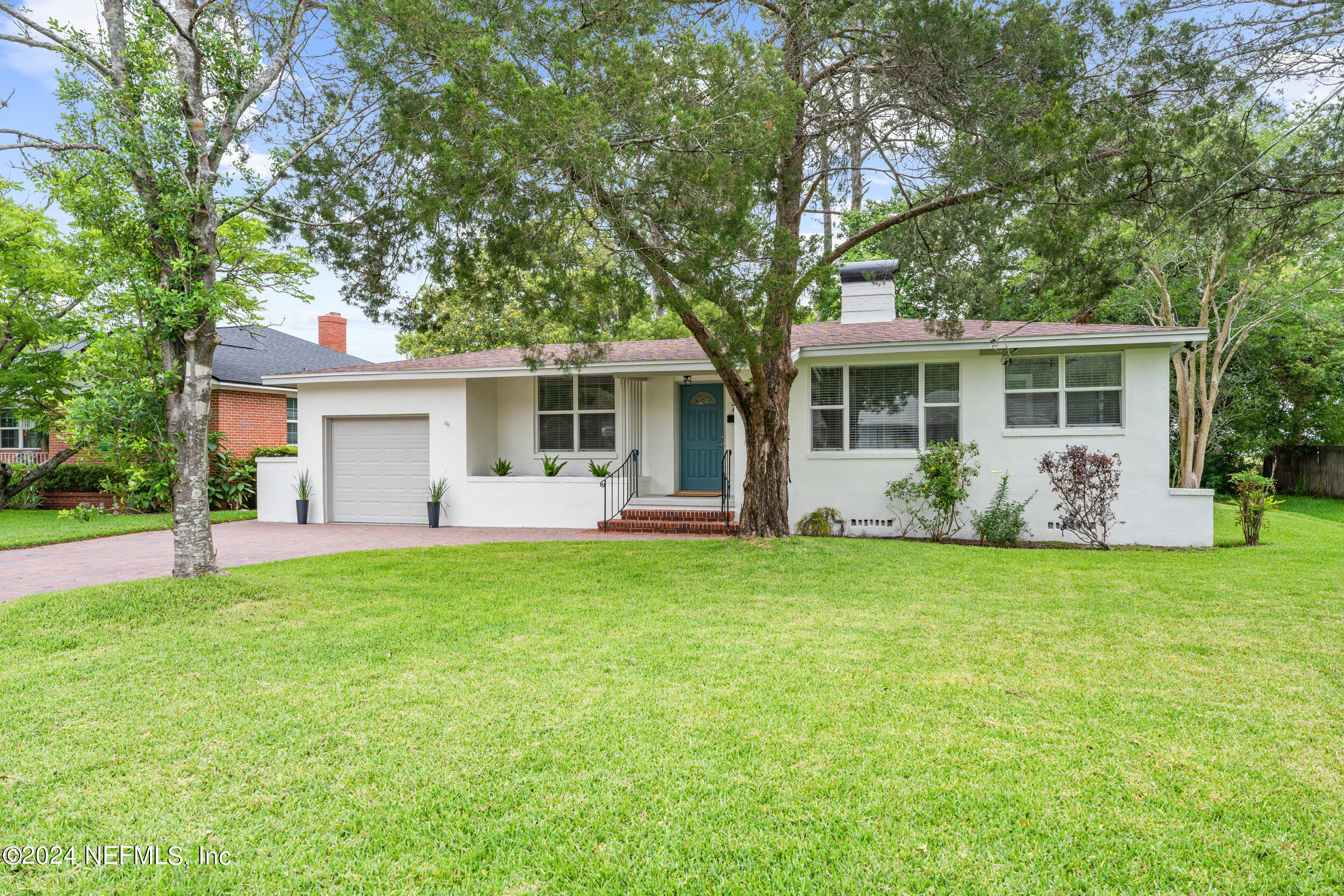 755 Old Hickory Road Jacksonville, FL 32207 - Photo 1 of 30 front view of a house with a yard