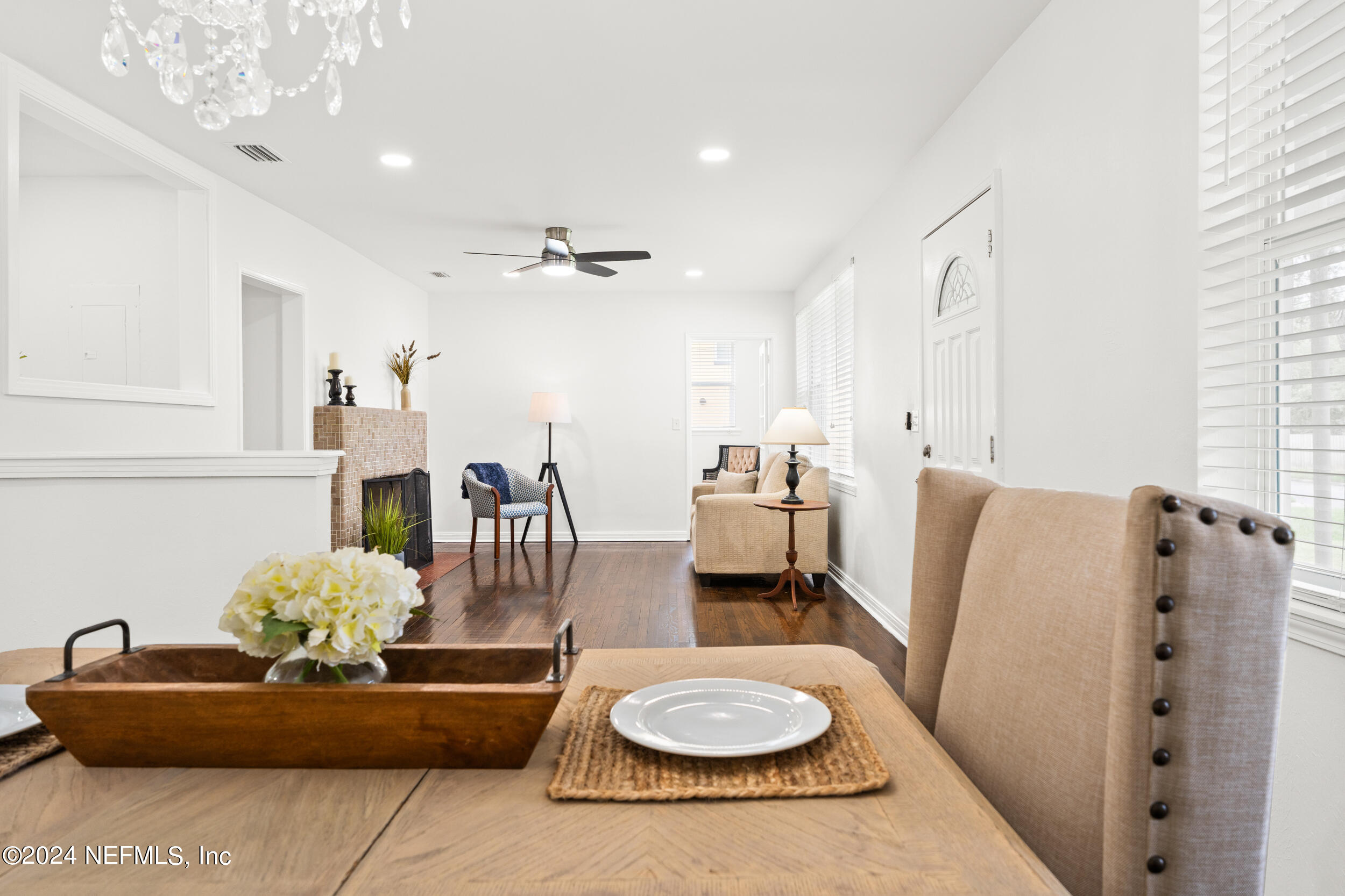 755 Old Hickory Road Jacksonville, FL 32207 - Photo 11 of 30 a living room with furniture and a chandelier