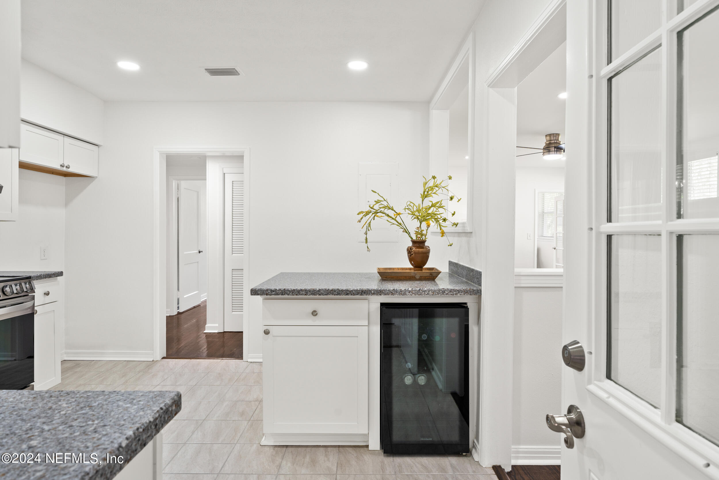 755 Old Hickory Road Jacksonville, FL 32207 - Photo 14 of 30 a spacious bathroom with a granite countertop sink a mirror and a shower