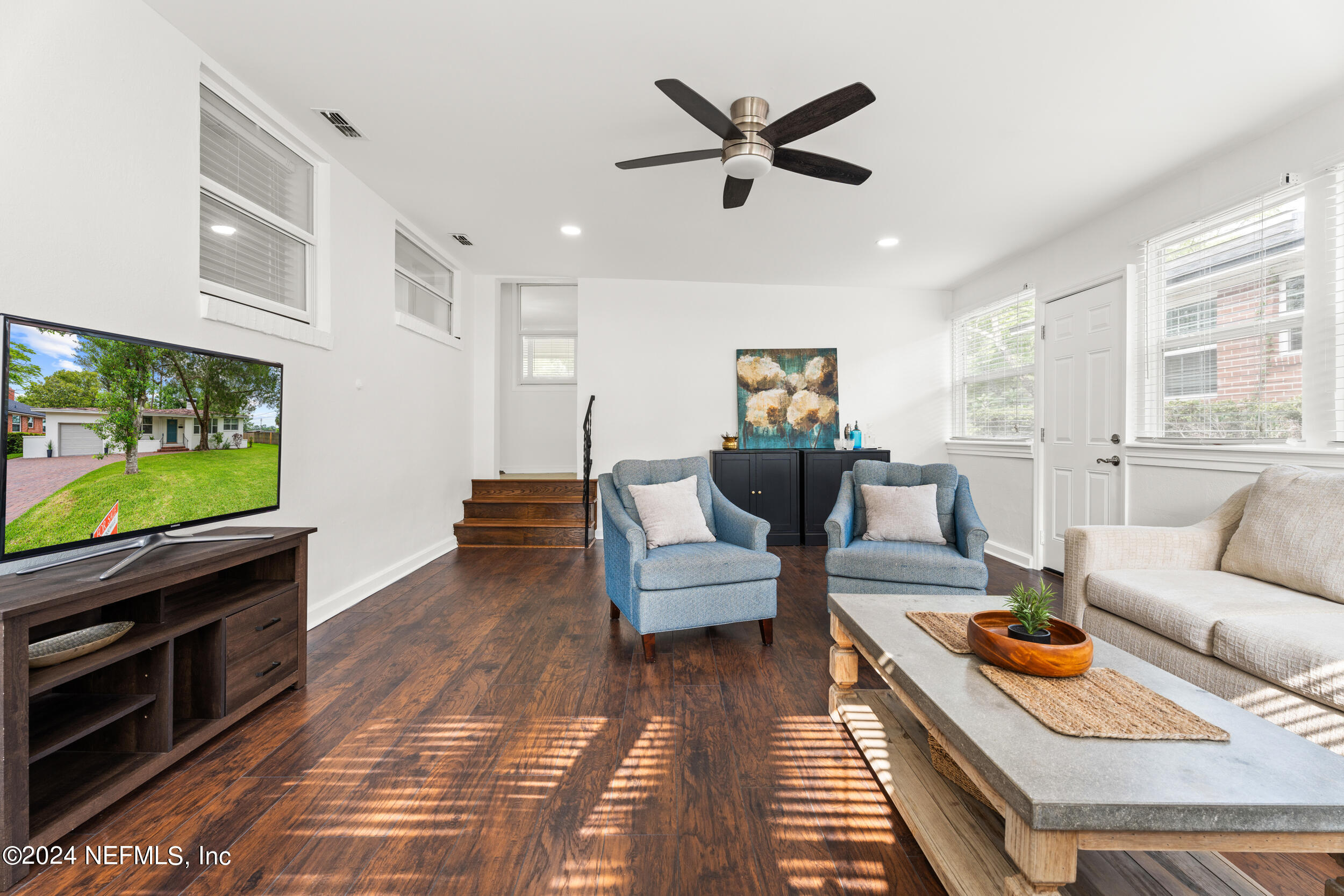 755 Old Hickory Road Jacksonville, FL 32207 - Photo 17 of 30 a living room with furniture and a flat screen tv