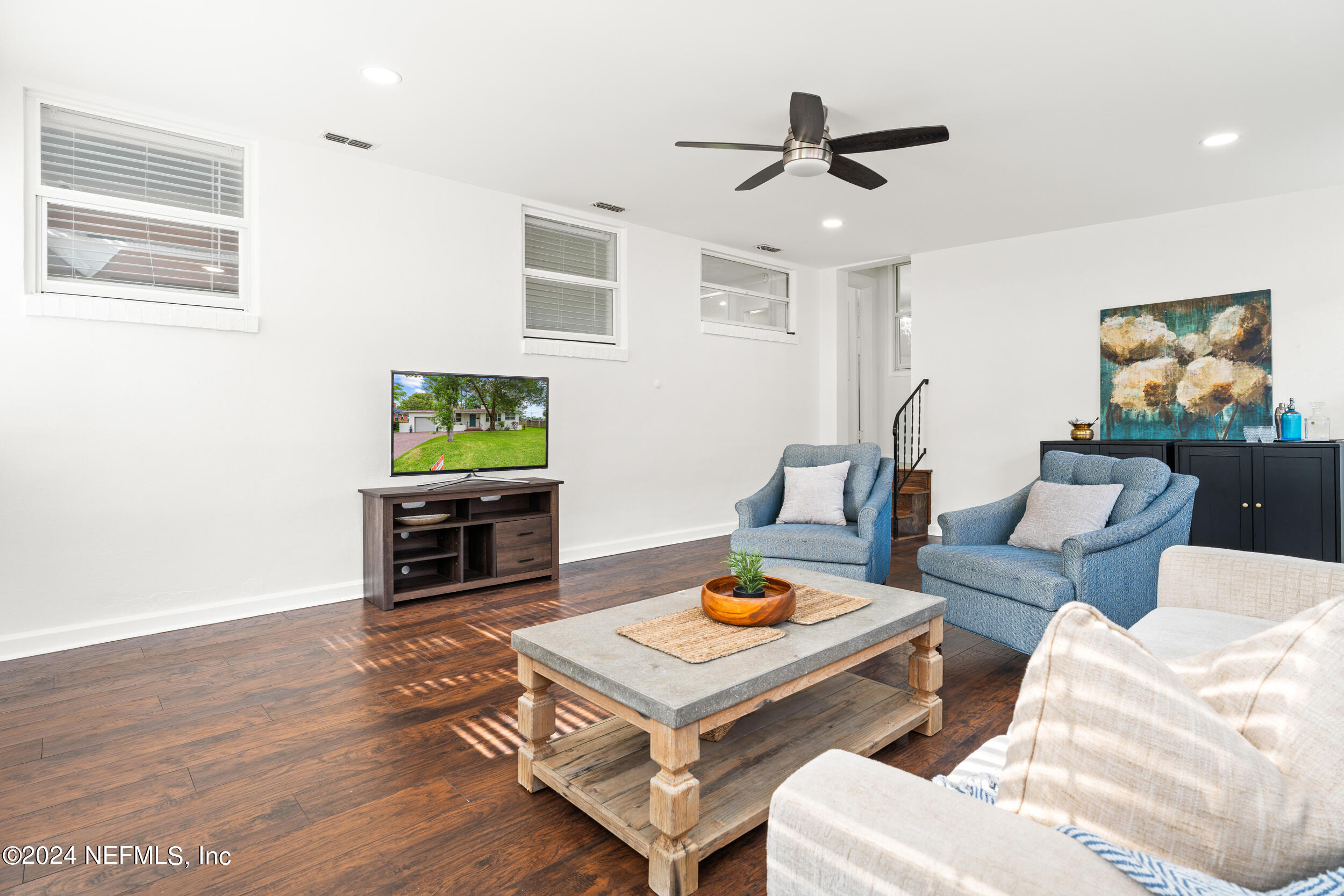 755 Old Hickory Road Jacksonville, FL 32207 - Photo 18 of 30 a living room with furniture and a wooden floor
