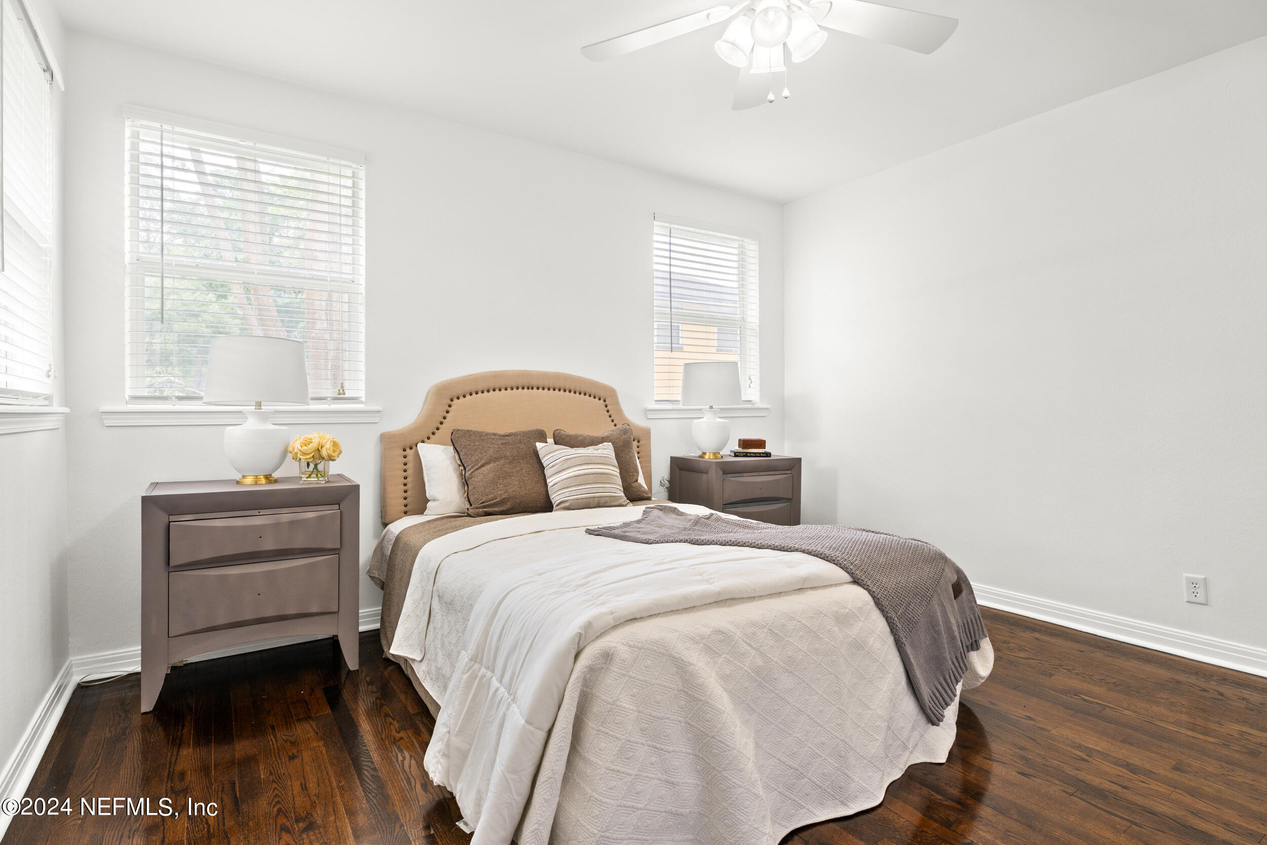 755 Old Hickory Road Jacksonville, FL 32207 - Photo 20 of 30 a bedroom with a bed and a large window