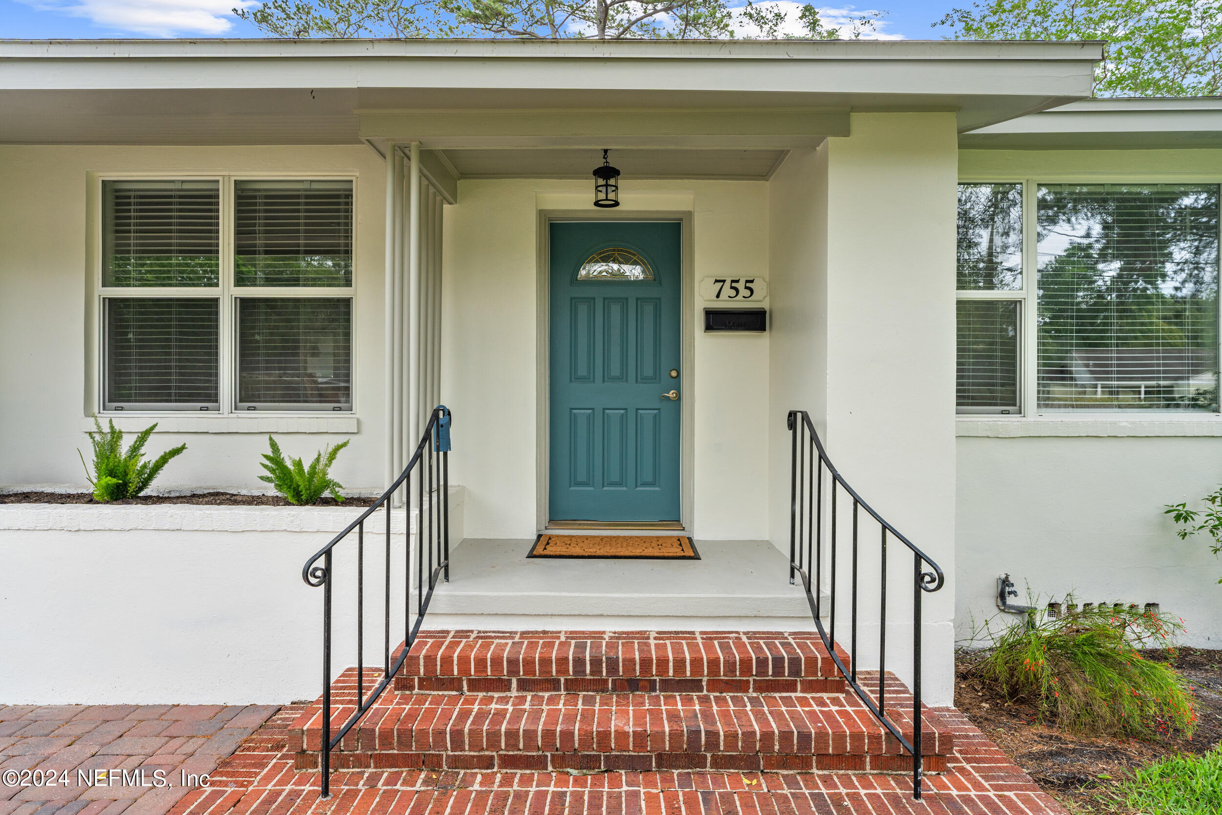 755 Old Hickory Road Jacksonville, FL 32207 - Photo 3 of 30 a front view of a house with a porch
