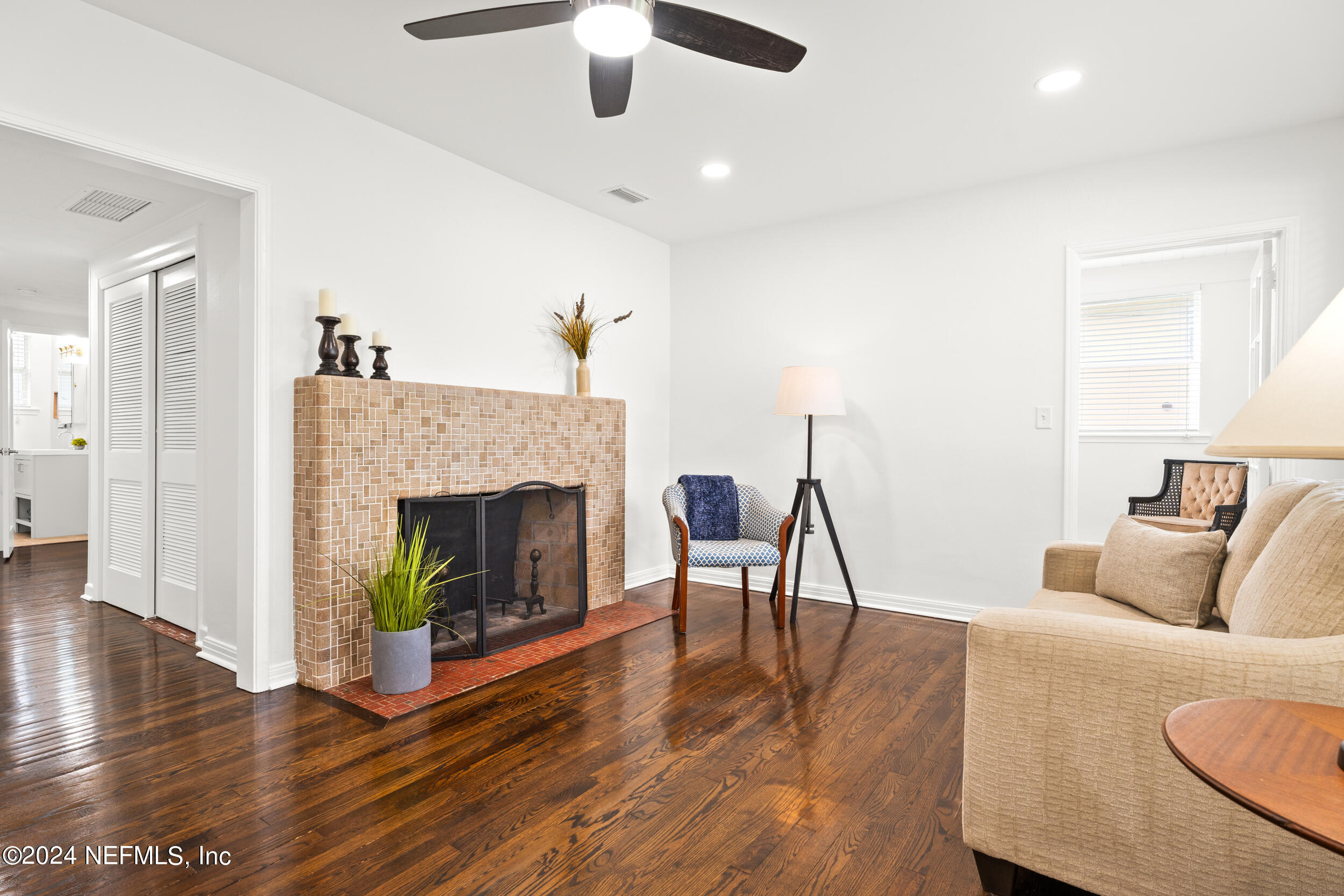 755 Old Hickory Road Jacksonville, FL 32207 - Photo 4 of 30 a living room with furniture and a fireplace