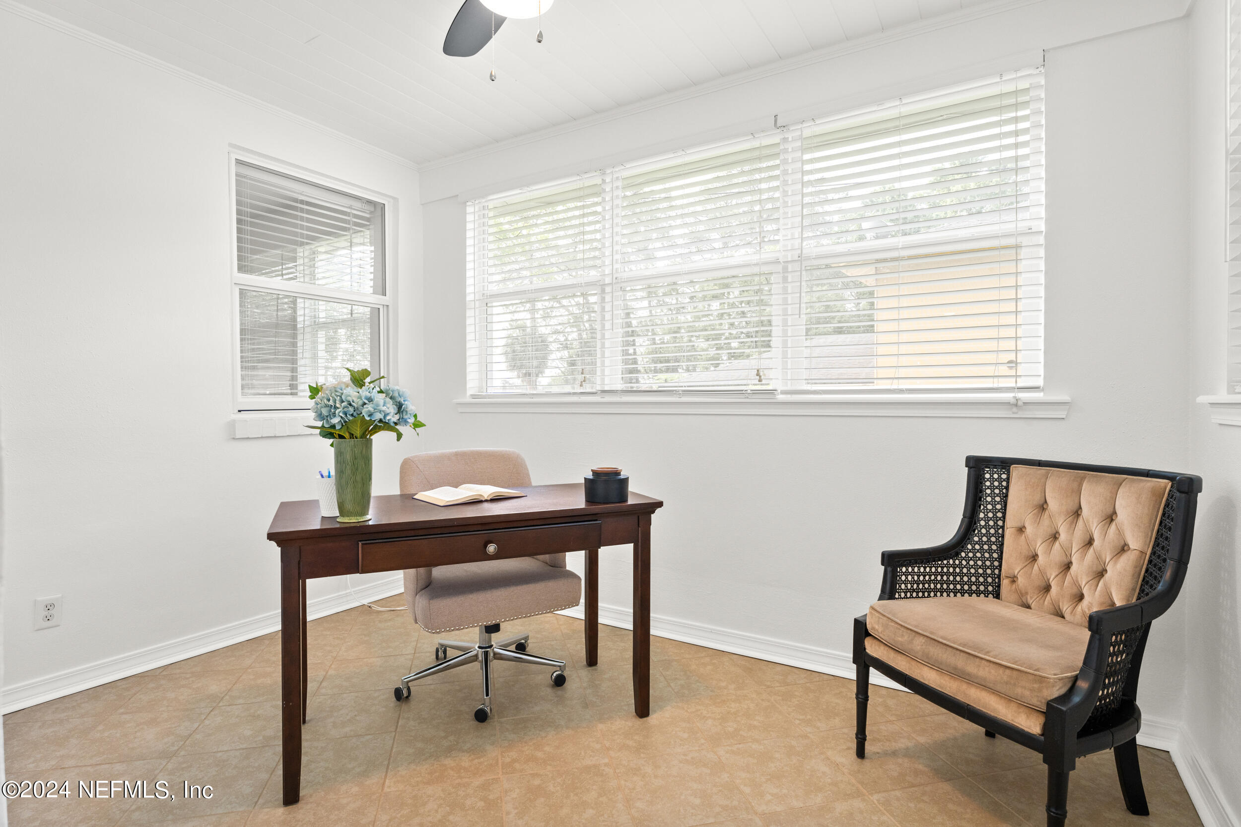 755 Old Hickory Road Jacksonville, FL 32207 - Photo 6 of 30 a view of a workspace with furniture and a window
