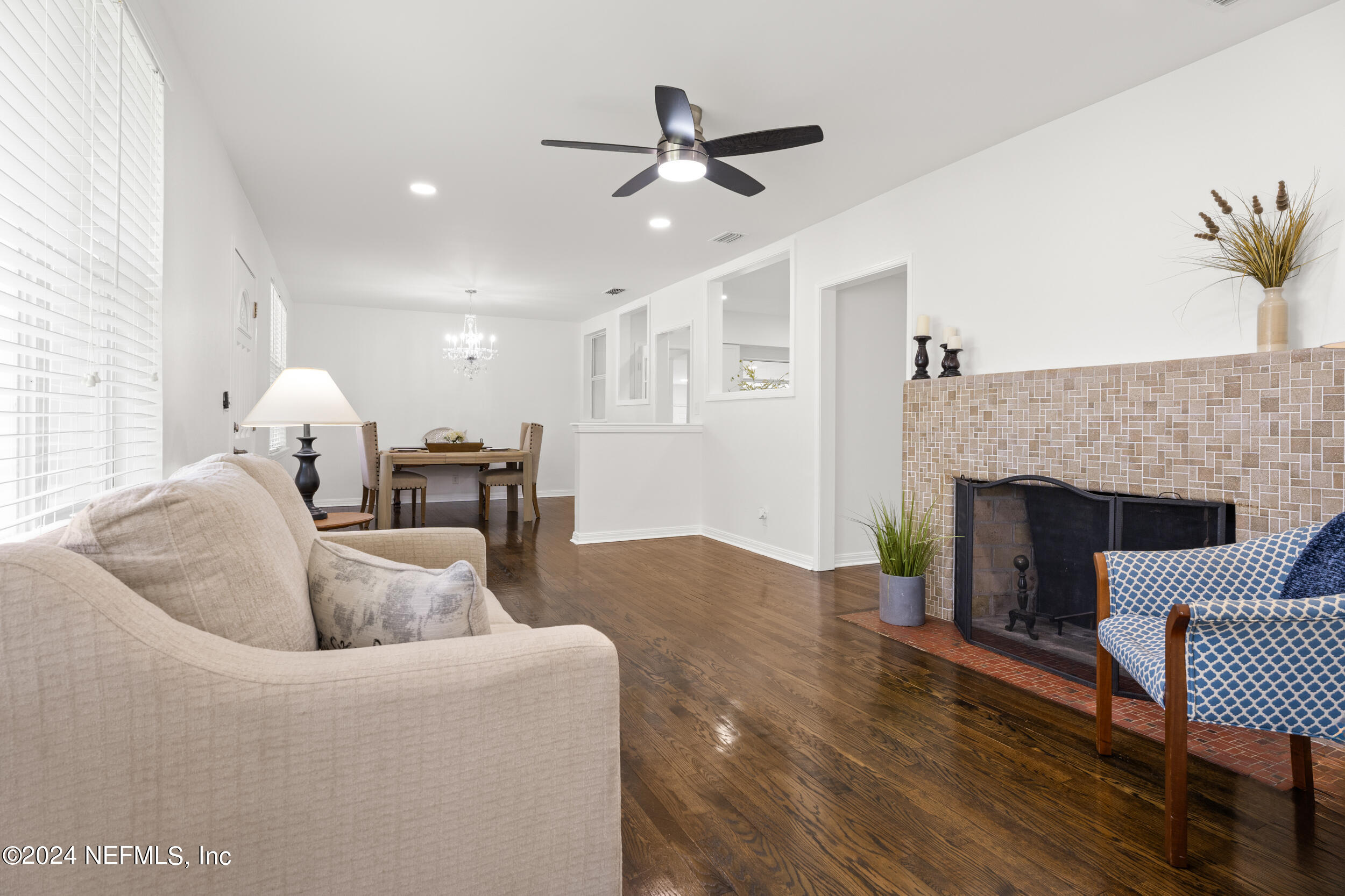 755 Old Hickory Road Jacksonville, FL 32207 - Photo 8 of 30 a living room with furniture and a fireplace