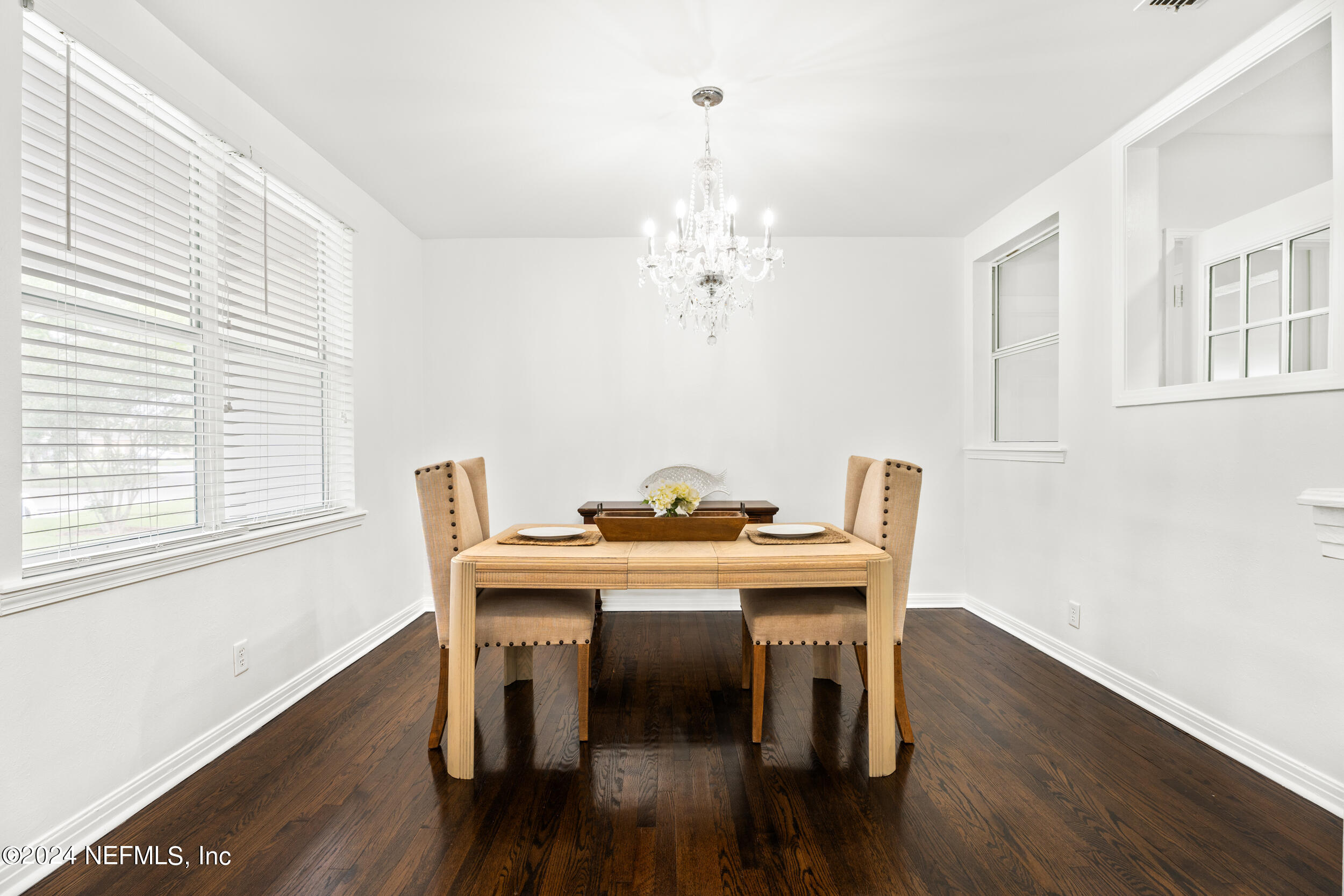 755 Old Hickory Road Jacksonville, FL 32207 - Photo 9 of 30 a view of a dining room with furniture window and wooden floor