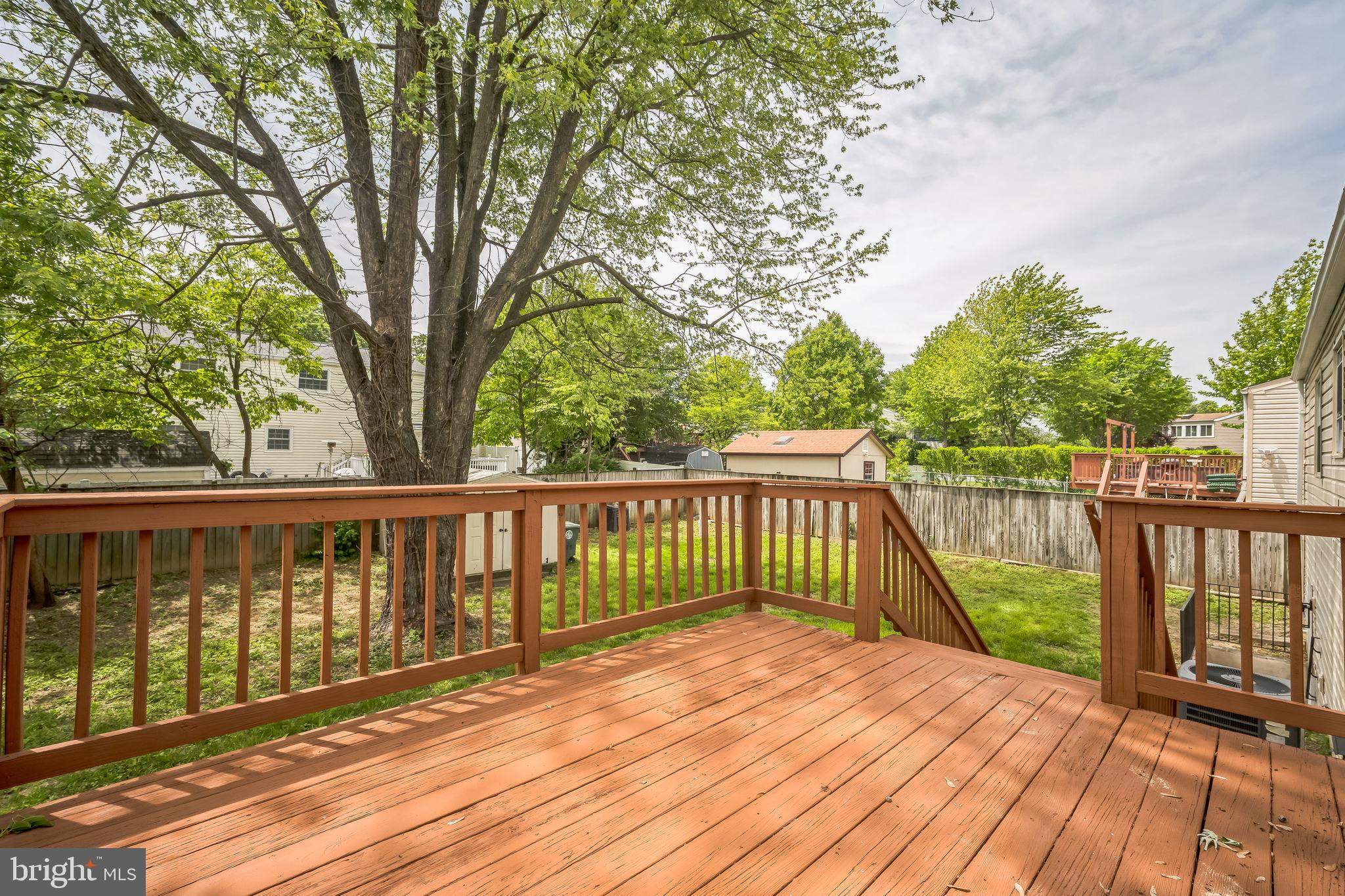 1797 Valleyside Drive Frederick, MD 21702 - Photo 15 of 38 a view of balcony with wooden floor and fence