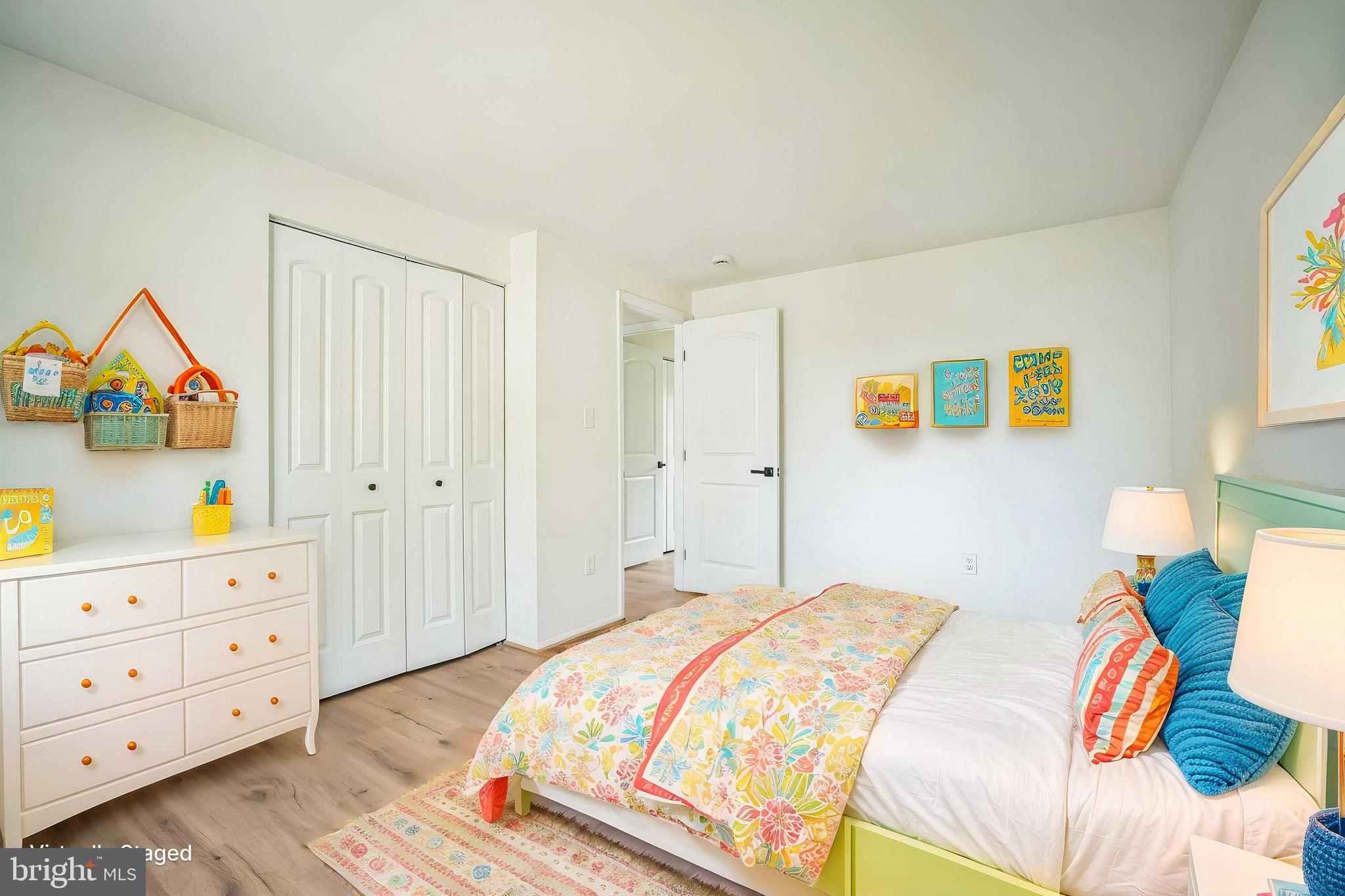 1797 Valleyside Drive Frederick, MD 21702 - Photo 16 of 38 a bedroom with a bed and a dresser in it