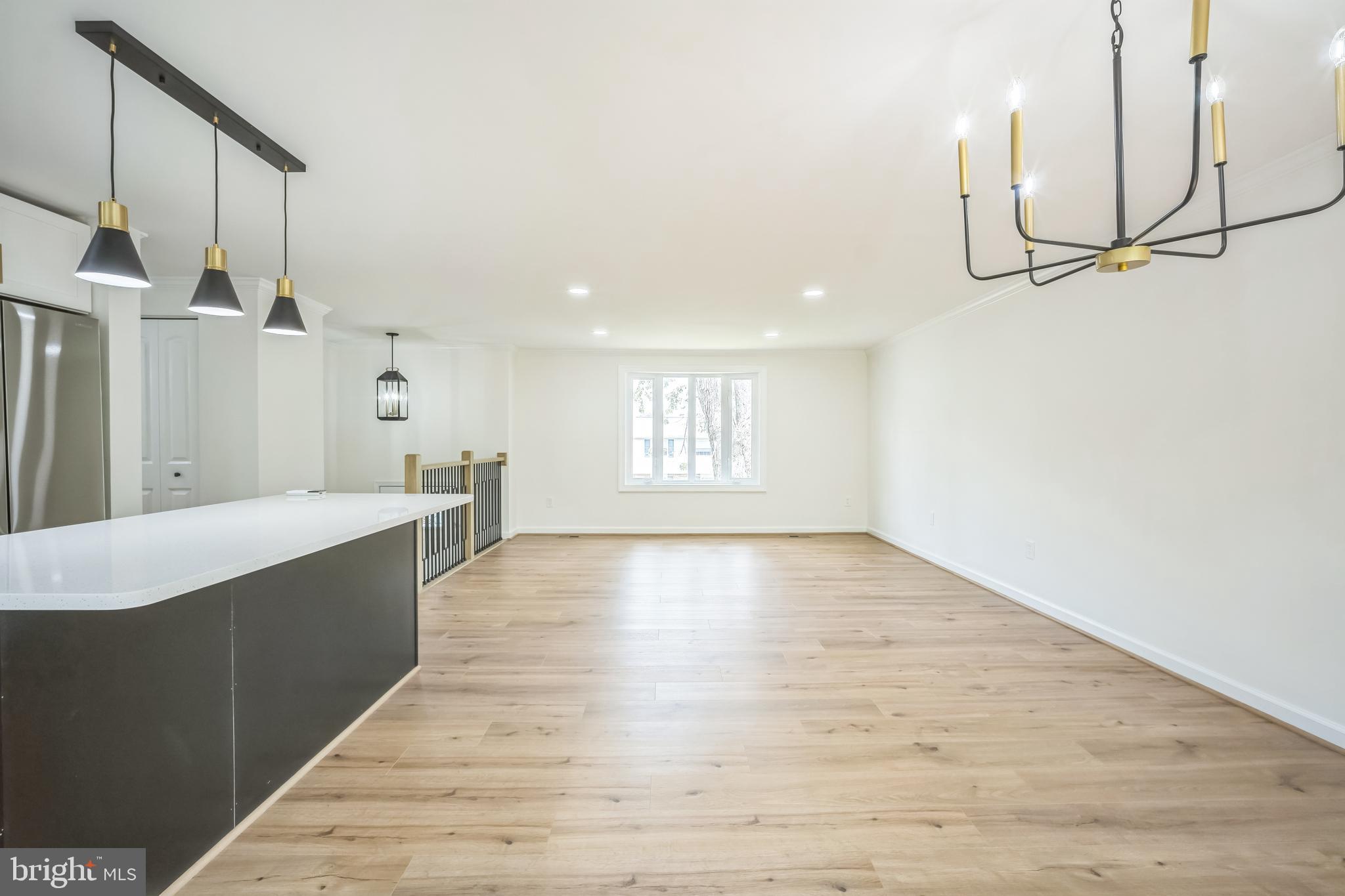 1797 Valleyside Drive Frederick, MD 21702 - Photo 23 of 38 a view of a kitchen with wooden floor and a window