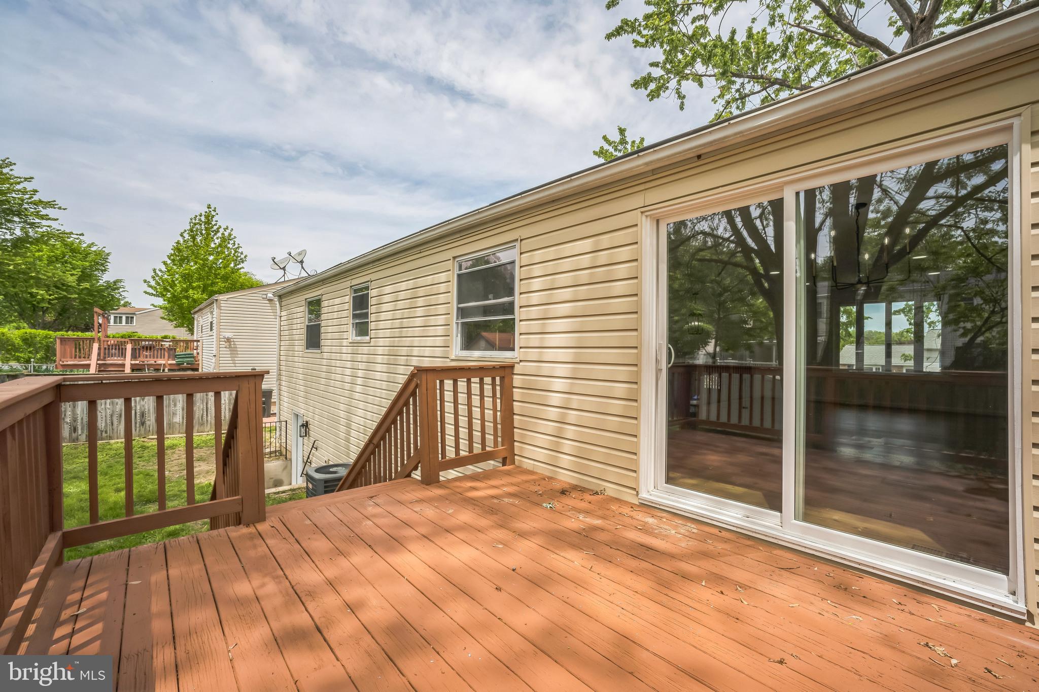 1797 Valleyside Drive Frederick, MD 21702 - Photo 37 of 38 a view of a house with wooden floor and iron stairs
