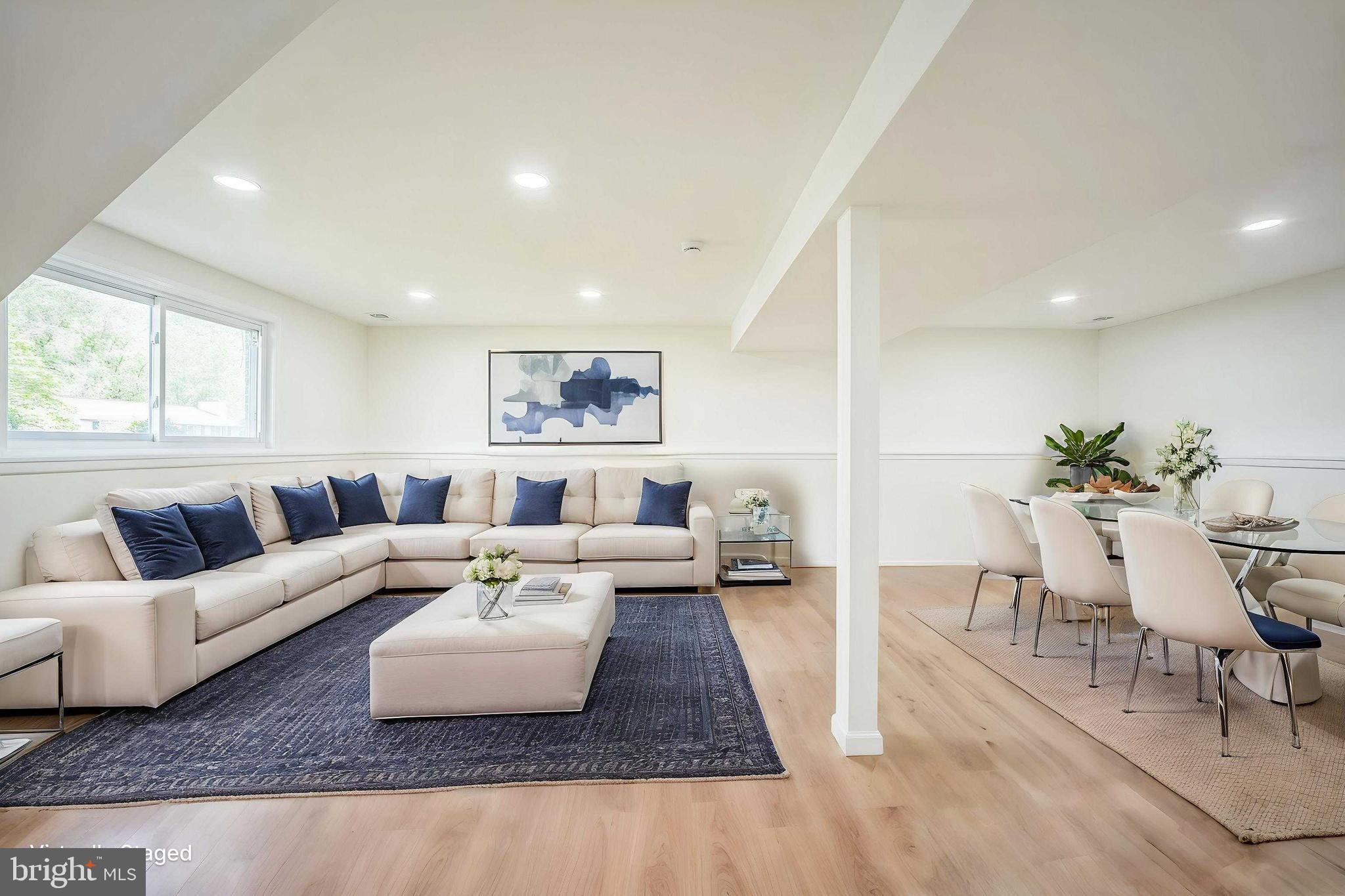 1797 Valleyside Drive Frederick, MD 21702 - Photo 10 of 38 a living room with furniture and a couch
