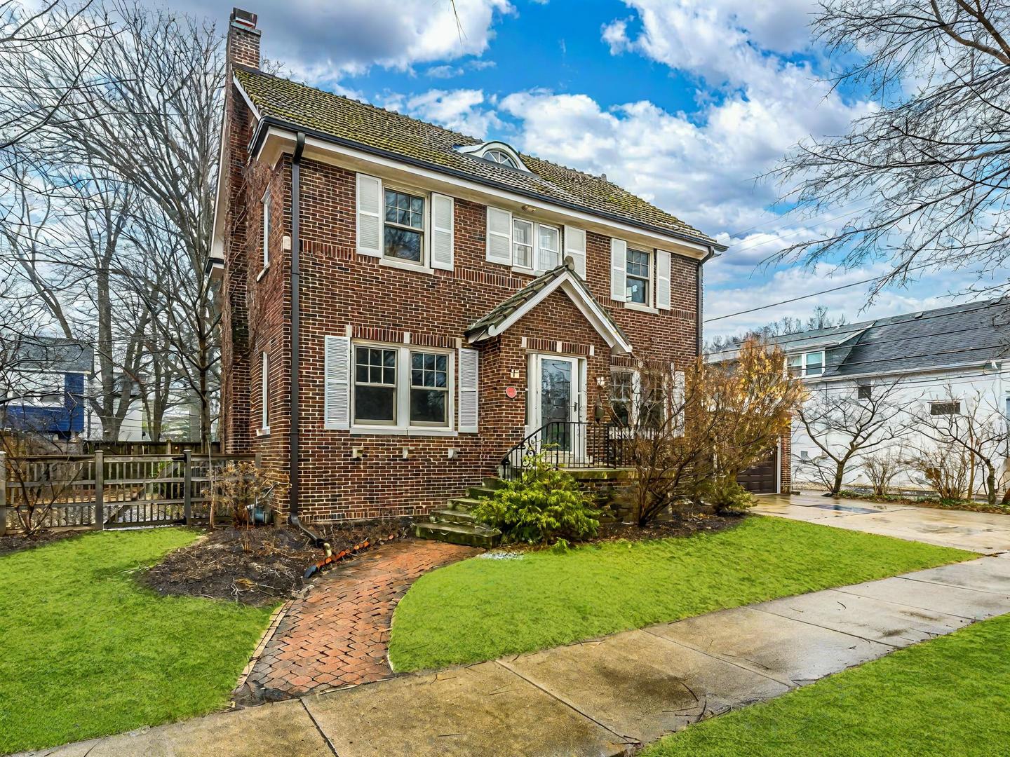 2235 Bennett Avenue Evanston, IL 60201 - Photo 1 of 1 a front view of a house with garden