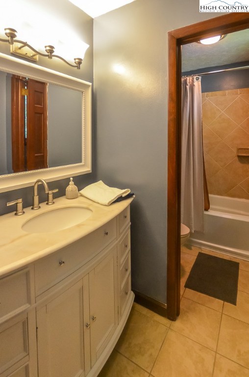 165 Wilson Ridge Road Boone, NC 28607 - Photo 12 of 22 a bathroom with a sink a toilet and mirror