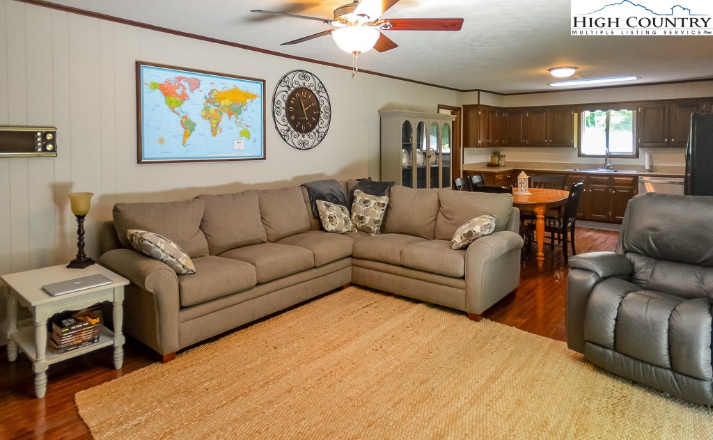 165 Wilson Ridge Road Boone, NC 28607 - Photo 8 of 22 a living room with furniture and a view of kitchen