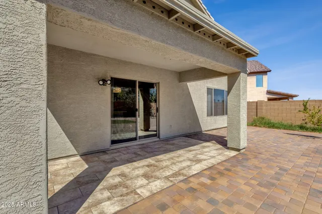 a view of a backyard of a house