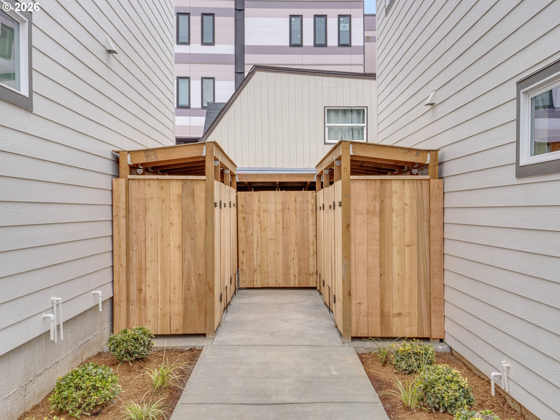 5871 Northeast Prescott Street Portland, OR 97218 - Photo 24 of 25 a view of a house with wooden walls