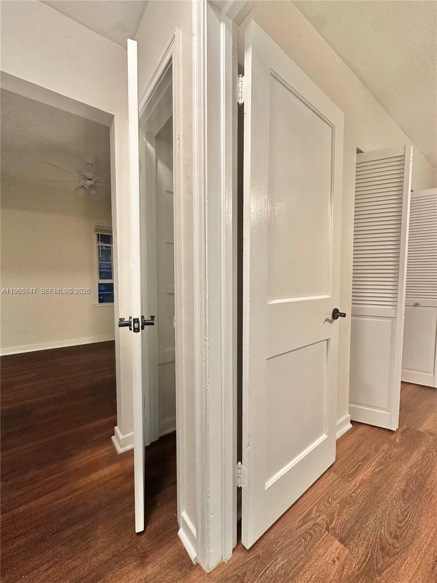 430 76th Street, Unit 4 Miami Beach, FL 33141 - Photo 16 of 24 a view of front door with wooden floor