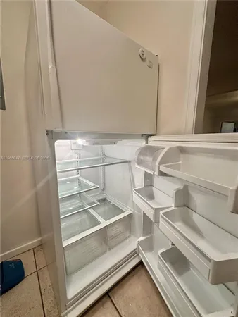 a view of a room with an empty space