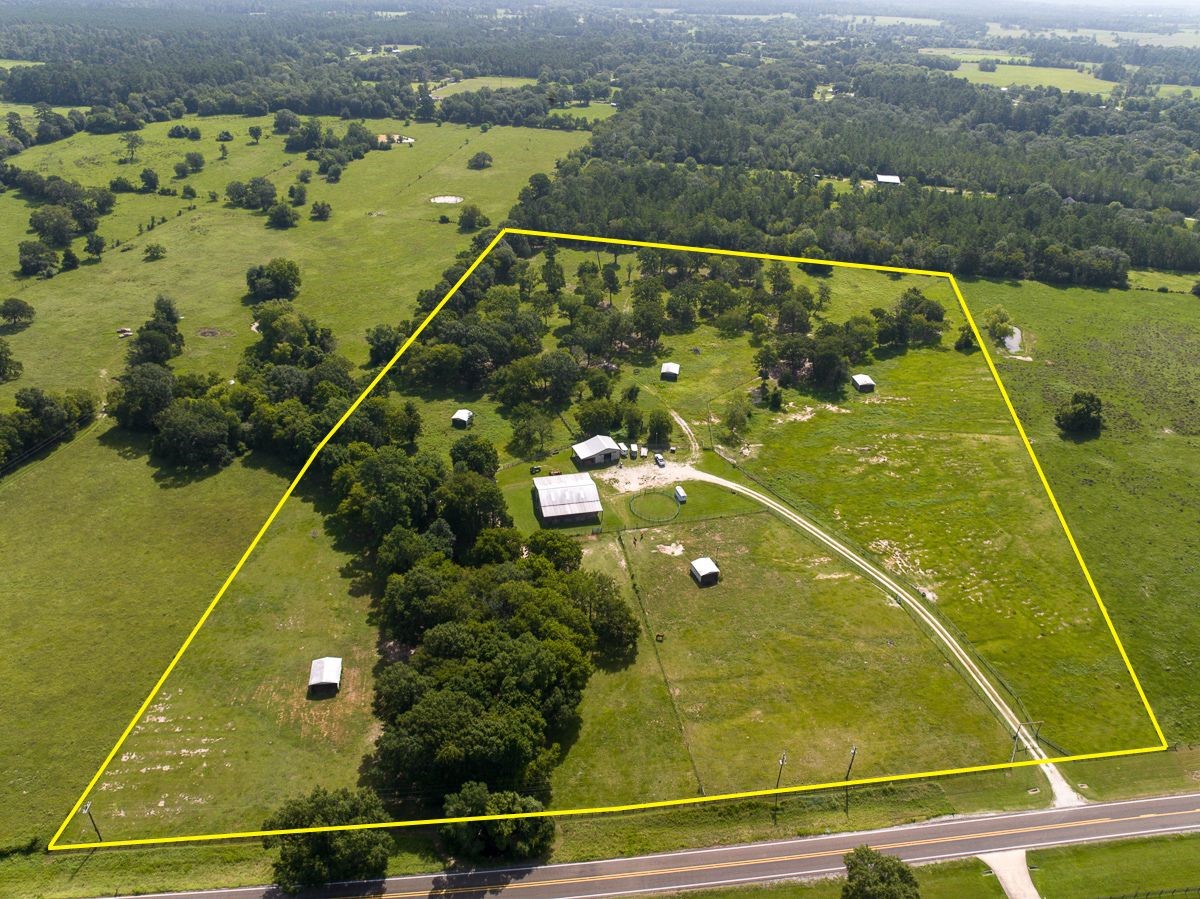 0 Fm 3179 Huntsville, TX 77340 - Photo 1 of 27 a view of a swimming pool and an outdoor seating