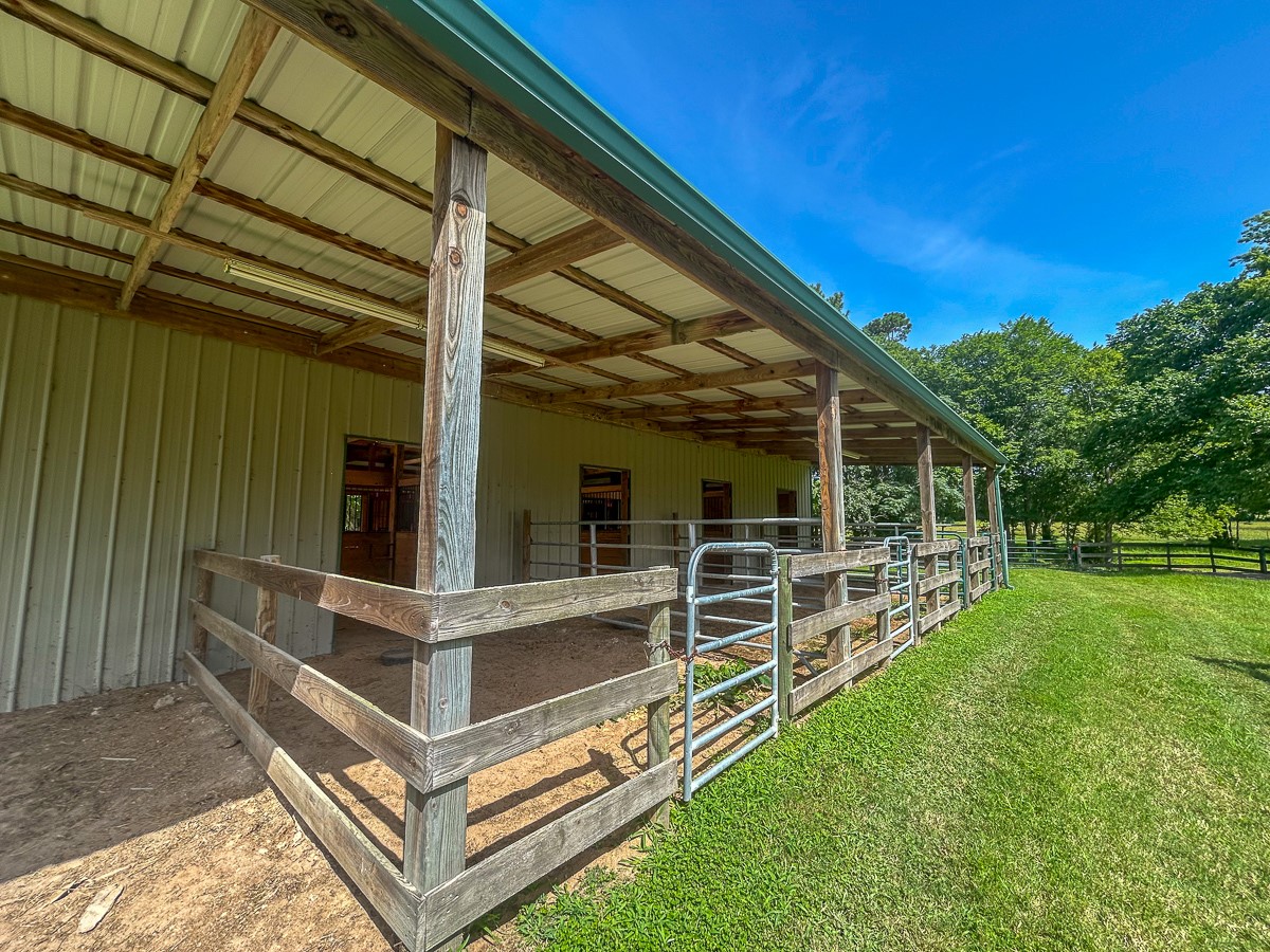 0 Fm 3179 Huntsville, TX 77340 - Photo 11 of 27 a view of house with backyard and deck